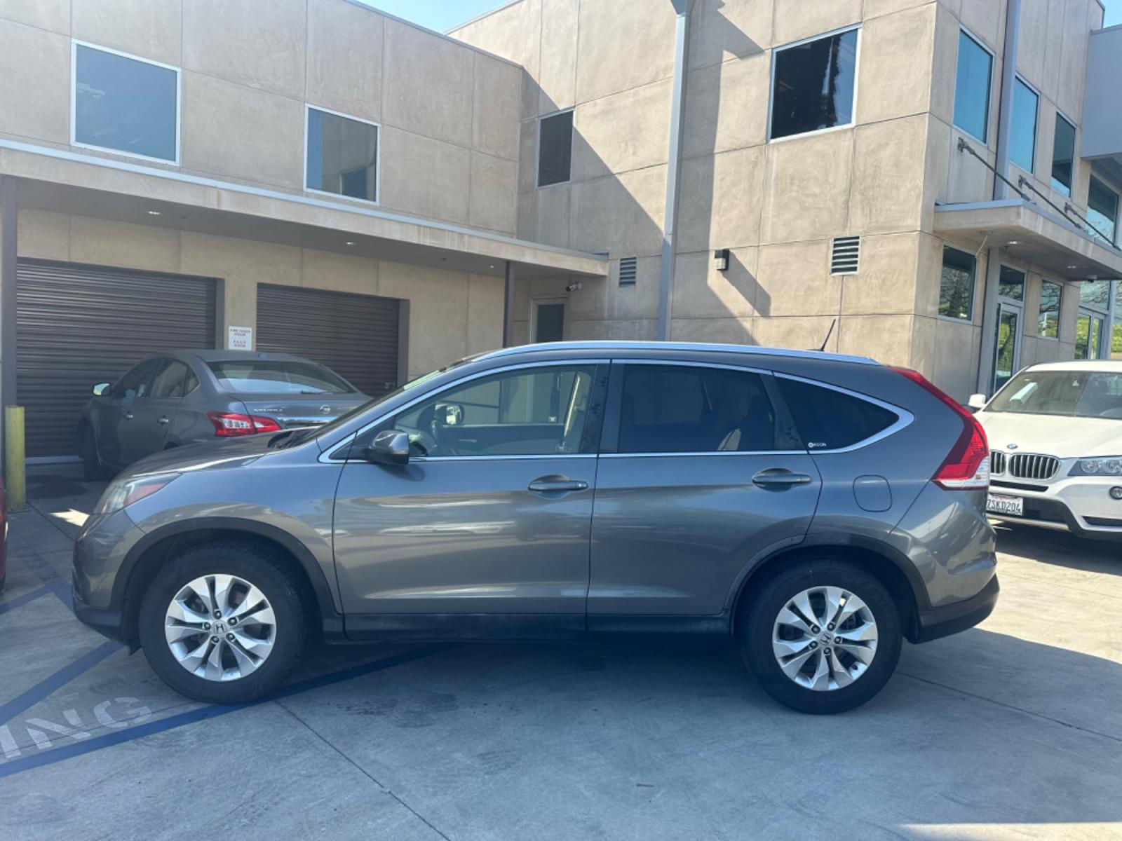 2012 BLUE /GRAY Honda CR-V leather (JHLRM3H70CC) with an 4 CYLINDER engine, Automatic transmission, located at 30 S. Berkeley Avenue, Pasadena, CA, 91107, (626) 248-7567, 34.145447, -118.109398 - Photo #2